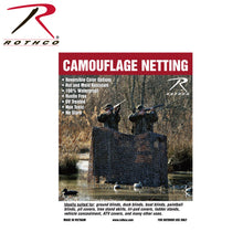 Load image into Gallery viewer, photo of rothco camouflage netting with two hunters behind it
