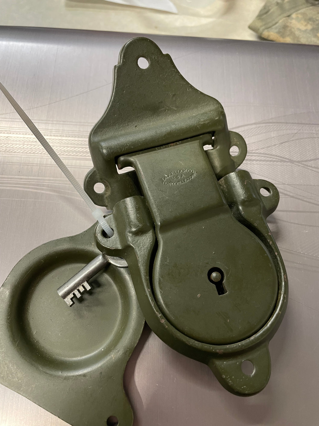 Vintage military footlocker lock parts with key