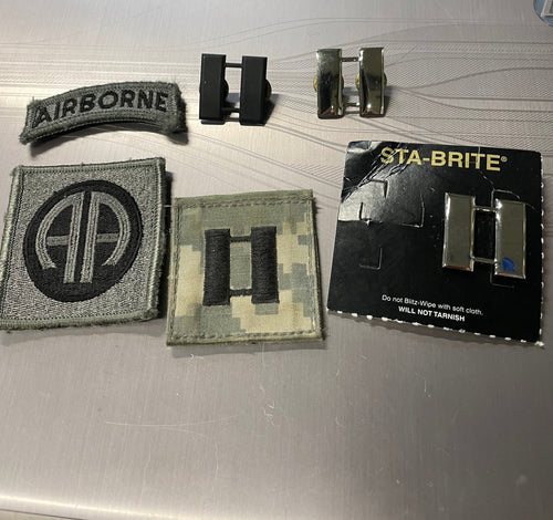 Mixed military airborne patches and rank front view