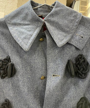 Load image into Gallery viewer, CLOSE UP OF CAPE COLLAR AND DECORATIVE TOGGLES
