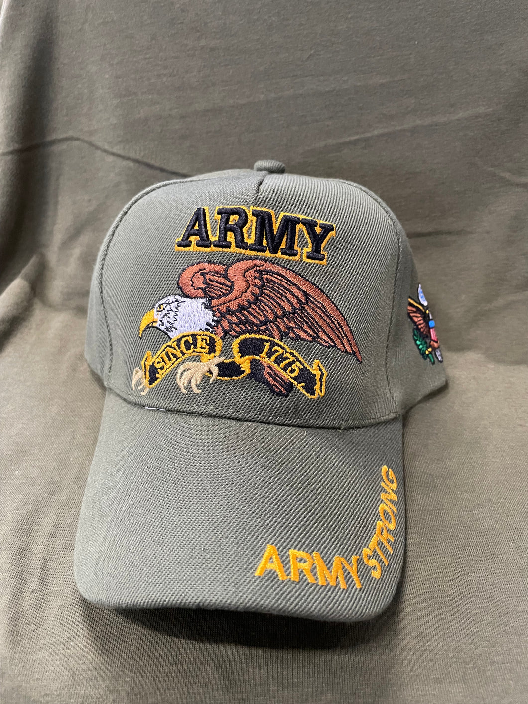 FRONT VIEW OF OLIVE DRAB ARMY STRONG HAT