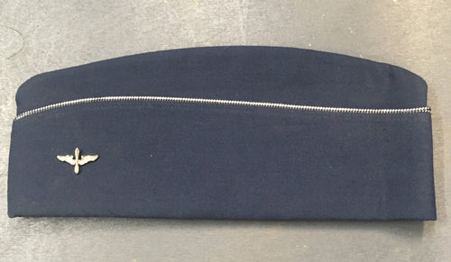 Left side of blue wool army air corps garrison cap