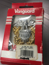Load image into Gallery viewer, front view vanguard navy cap device in see through box
