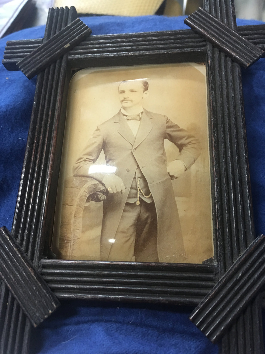 front view of antique glass photo in frame